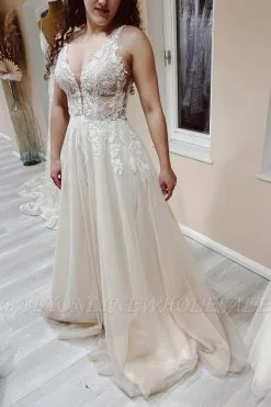 Deep V-neck Sleeveless Ivory A-line Tulle Wedding Dress